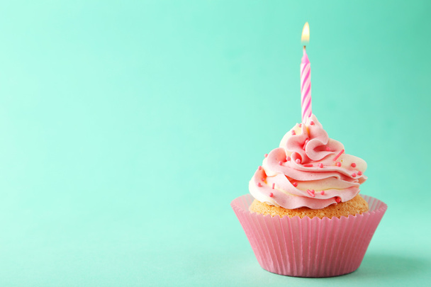 Tasty cupcake with candle - Foto, imagen