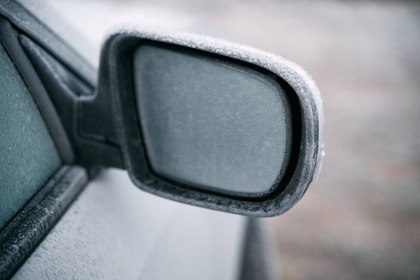 side view mirror covered with hoarfrost. frosty morning - Fotoğraf, Görsel