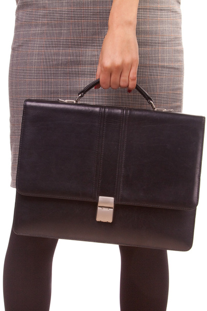 Woman and a black leather briefcase. - Φωτογραφία, εικόνα