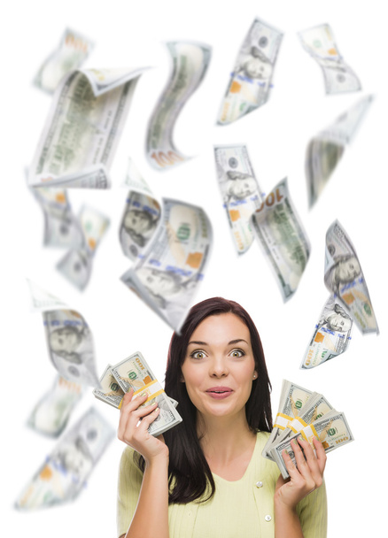 Mujer feliz sosteniendo billetes de cien dólares con muchos cayendo alrededor
 - Foto, imagen