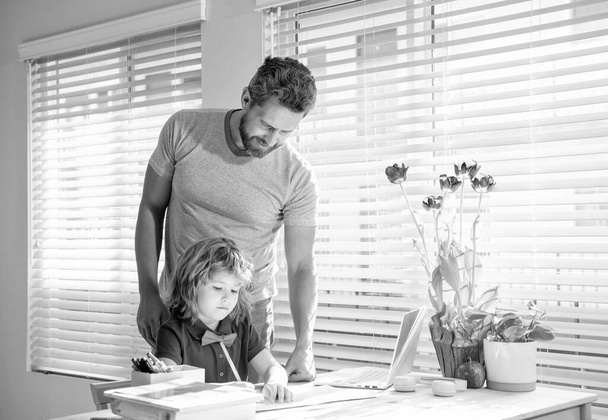 boy study with teacher. private drawing lesson. education concept. homeschooling and help. back to school. parenthood. helping father and son writing at home. family day. - Photo, Image