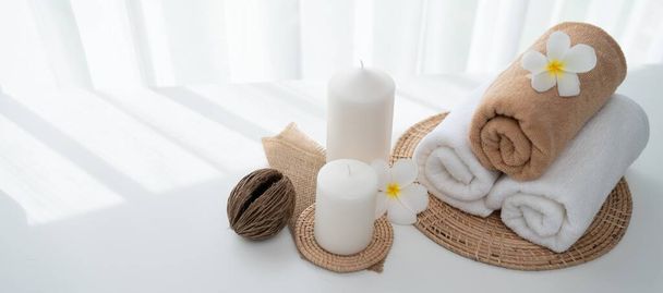 Spa accessory composition set in day spa hotel , beauty wellness center . Spa product are placed in luxury spa resort room , ready for massage therapy from professional service . - Fotografie, Obrázek