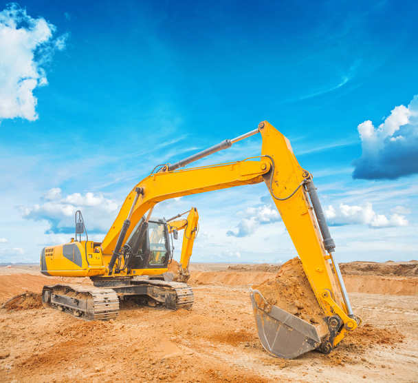 Excavator on construction site - Фото, изображение