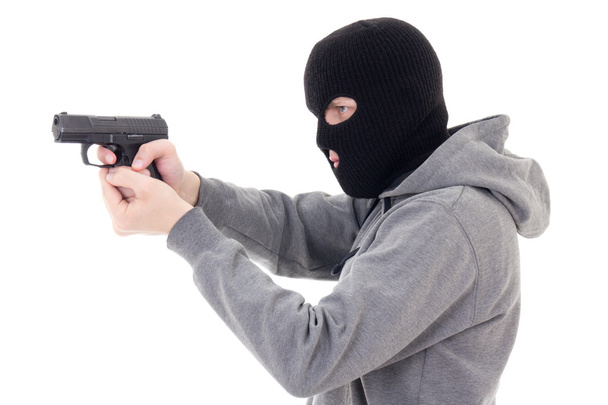 Man in mask shooting with gun isolated on white - Zdjęcie, obraz