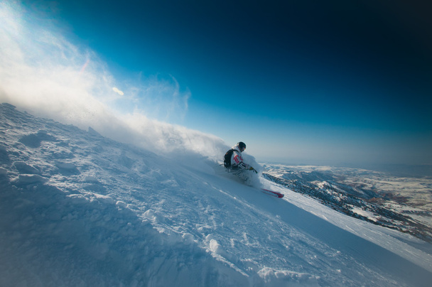 Skiing in fresh powder snow - Foto, imagen
