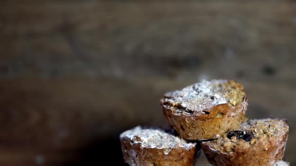 Fresh muffins banana with wooden background shallow focus turning and copy space. healthy bread banana cupcakes - Filmati, video