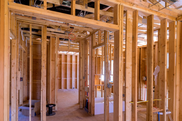 During framing of newly constructed home, it imperative that all communication cables plumbing are installed before plasterboard is applied. - Photo, Image