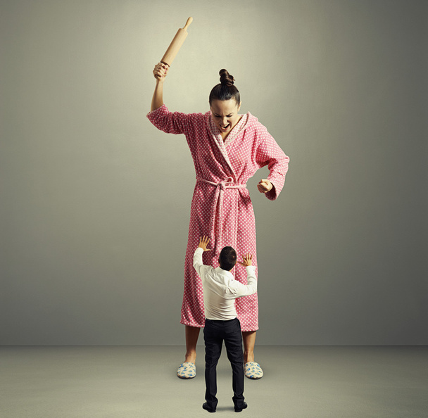 aggressive housewife with rolling pin - 写真・画像