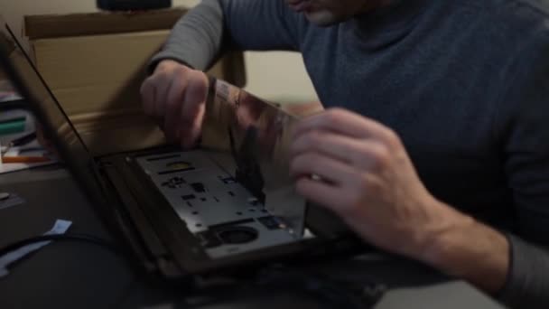 removing keyboard from laptop damaged laptop repair disassembly process - Footage, Video