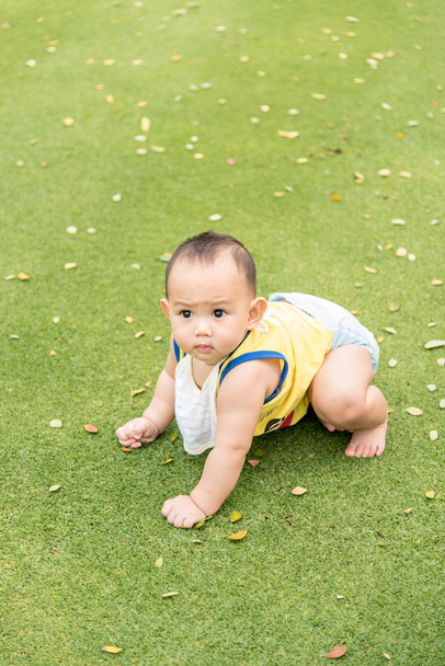 Baby boy in action at the park - Foto, imagen