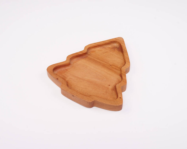 cute plates that are shaped as attractive as possible so that children are excited to eat. aesthetic plate made of wood crafts. the result of a cnc router machine with a computerized process. - Fotografie, Obrázek