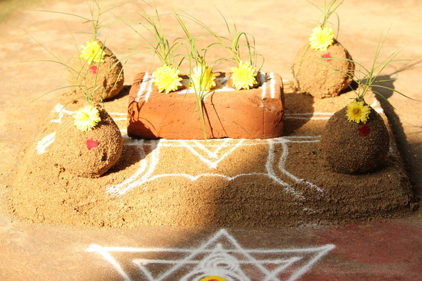 celebrating Traditional Thai Pongal festival to sun god with pot, lamp,wood fire stove, fruits and sugarcane - 写真・画像