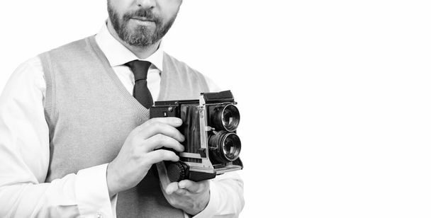 cropped man hold retro photo camera isolated on white, copy space, photographing. - Foto, Bild