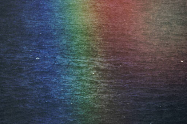 Rainbow after the rain over the Atlantic ocean in the Faroe Islands - Photo, Image