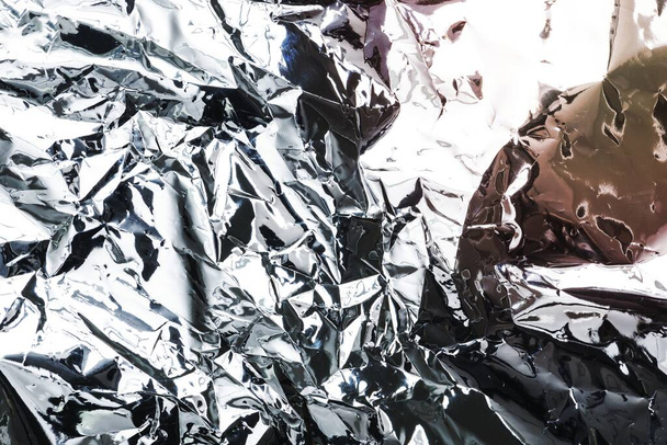 Смятый фоновый фон из алюминиевой фольги - Фото, изображение