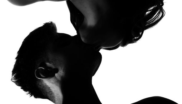 Man and a woman in love kissing - Foto, afbeelding