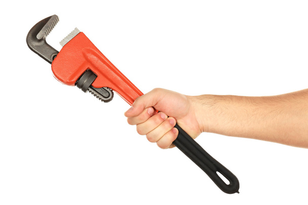 Plumbing wrench in male hand - Φωτογραφία, εικόνα