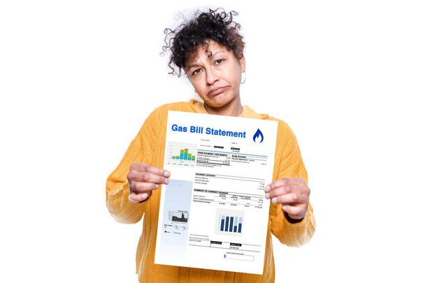 Broke indebted black woman showing energy bill cost increase - Photo, image