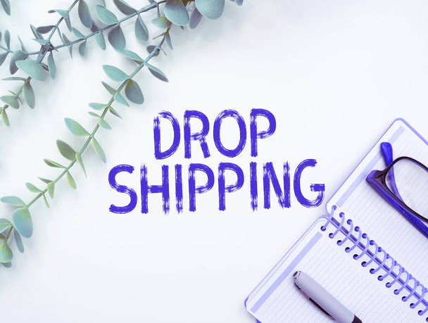 Hand writing sign Drop Shipping, Concept meaning to send goods from a manufacturer directly to a customer instead of to the retailer - Photo, Image