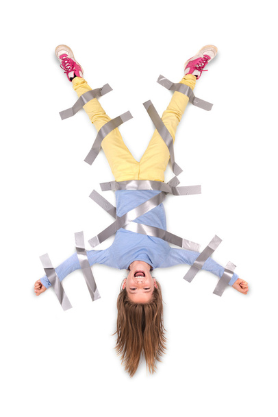 Girl tied to wall with tape - Фото, зображення