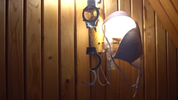 handcuffs and underwear on the lamp. - Imágenes, Vídeo
