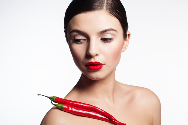 Beautiful girl with hot red cayennes - Fotoğraf, Görsel