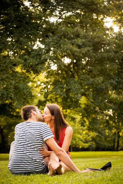 Young couple kissing on date - Photo, Image