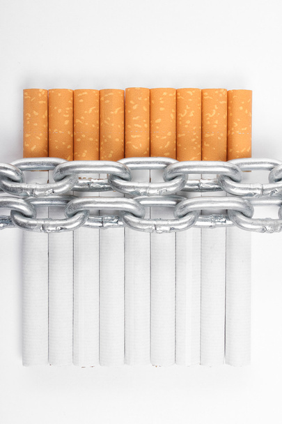 Chained cigarettes. Conceptual image. - Photo, Image