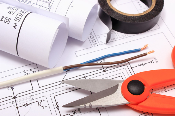 Accessories for engineer jobs and rolls of diagrams on construction drawing - Valokuva, kuva