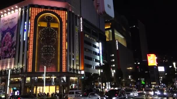 November 05, 2022: Tokyo, Japan, elegant and gorgeous Ginza night view, near 4-chome crossing Mitsukoshi - Felvétel, videó