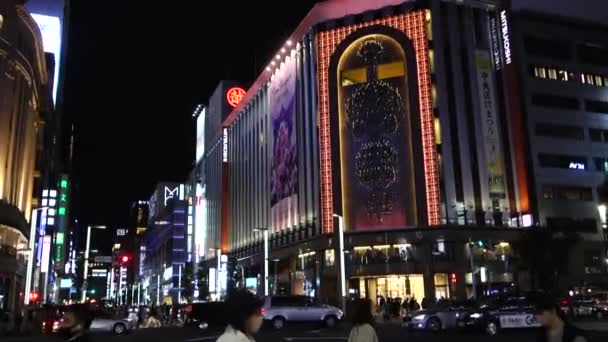 November 05, 2022: Tokyo, Japan, elegant and gorgeous Ginza night view, near 4-chome crossing Mitsukoshi - Felvétel, videó