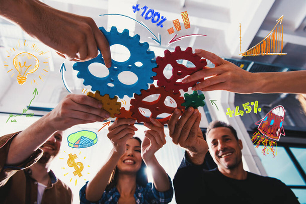 Teamwork of businesspeople work together and combine pieces of gears - Foto, Imagen