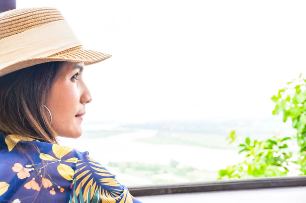 A Woman Traveler with White Sky Background at Chiang Saen District, Chiang Rai Province. - Fotó, kép