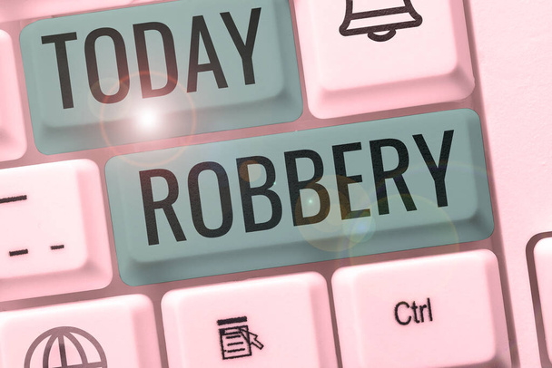 Writing displaying text Robbery, Business concept the action of taking property unlawfully from a person or place by force or threat of force - Photo, Image