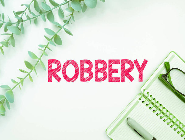 Text caption presenting Robbery, Concept meaning the action of taking property unlawfully from a person or place by force or threat of force - Foto, Imagen