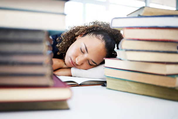 Woman, sleeping or medical student in stress, hospital research burnout or learning books fatigue. Tired, exhausted or asleep healthcare nurse in notebook studying or scholarship medicine internship. - Photo, Image