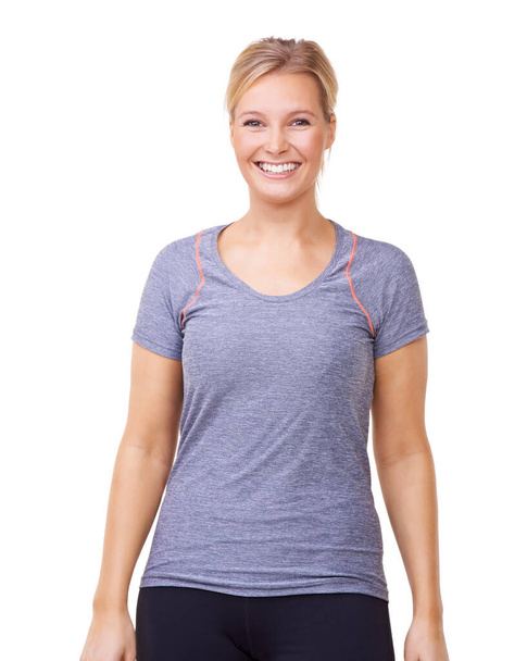 Fit werden, glücklich werden. Studioporträt einer attraktiven Frau in Turnbekleidung isoliert auf Weiß - Foto, Bild