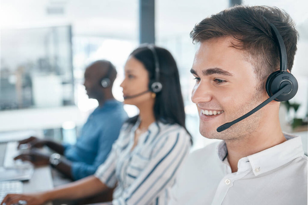 Call center, customer service and happy consultant team at crm or telemarketing office. Man and woman agent with diversity at pc for sales, contact us and online support or advice at help desk. - Foto, Bild