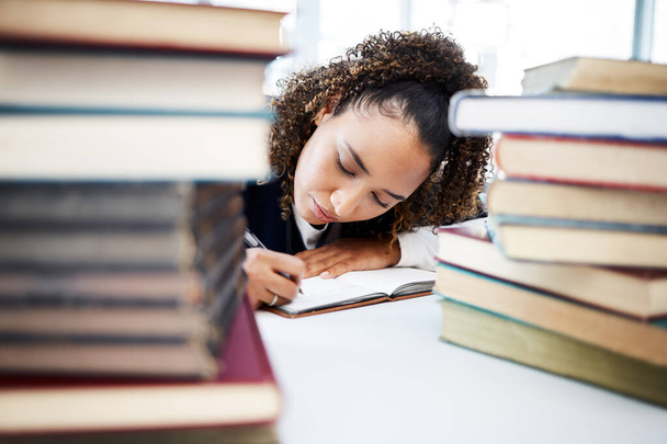 Student, writing or books stack in hospital research, education studying or university learning in medical school. Thinking, woman or healthcare nurse and notebook for medicine internship scholarship. - Photo, Image