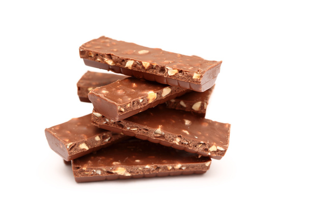 Chocolate pieces with nuts - Фото, изображение