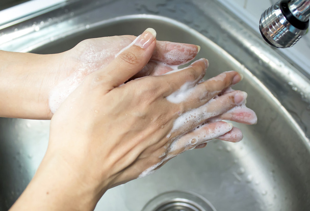 Washing of female hands  - Foto, Bild