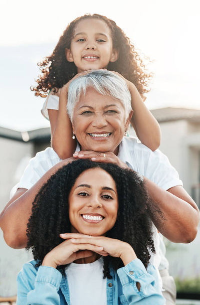 Portrait of happy family child, mother and grandmother bonding, smile and enjoy quality summer time together. Love, outdoor sunshine and generation face of people on vacation in Rio de Janeiro Brazil. - Foto, afbeelding