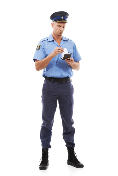 Ticket, parking fine and police writing on notepad for traffic laws, public service and crime on white background. Justice, law enforcement and isolated policeman, security guard and safety officer. - Foto, Bild