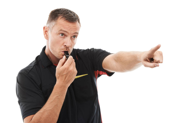 Sport, man and referee blowing whistle, pointing or gesture .in studio warning, sign or message on white background. Sports, coach and hand for rules, compliance and caution while training isolated. - Photo, Image