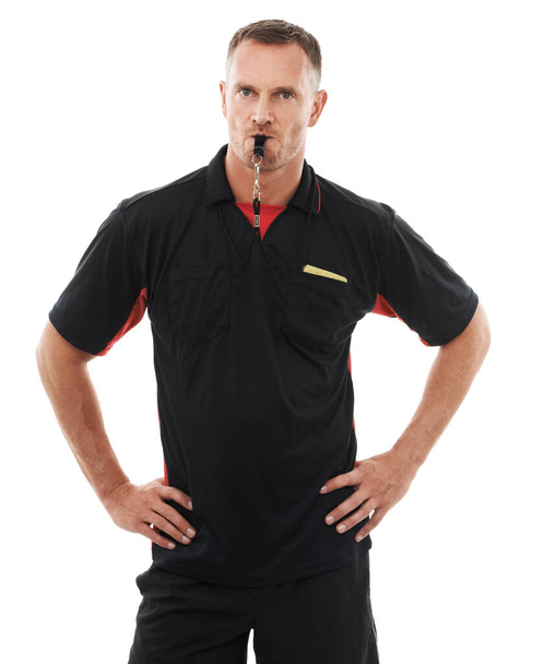 Referee man, portrait and whistle, angry with soccer foul and warning in match or game isolated on white background. Sports, fitness and compliance, rules and male in studio with football penalty. - Valokuva, kuva
