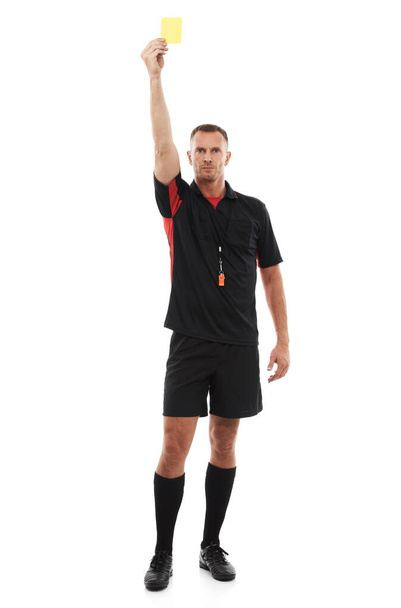 Sports referee, man and yellow card warning for soccer rules, penalty or fail in studio. Fitness coach color sign for mistake, caution or flag for competition game isolated on a white background. - Foto, Imagem
