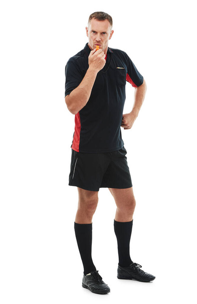 Referee man, portrait and angry whistle blow, soccer foul and warning in match or game isolated on white background. Sports, fitness and compliance, rules and male in studio with football penalty. - 写真・画像