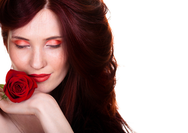 Portrait of sensual beautiful woman with red rose on white backg - Photo, image