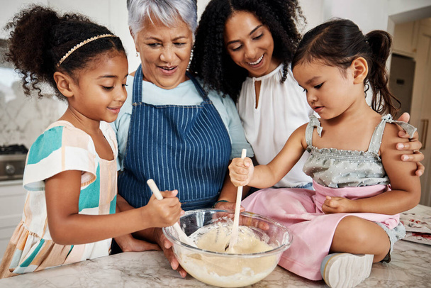 Learning, big family and cooking kids in kitchen mixing baking dough in bowl in home. Education, care and mother and grandma teaching children how to bake, bonding and enjoying quality time together - Foto, Imagen