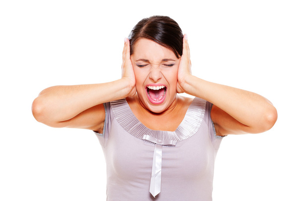 Mujer estresante cubriéndose los oídos
 - Foto, imagen